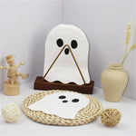 serviettes papier fantôme blanc noir yeux noirs clips métalliques halloween décoration événement festive minimaliste