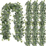 guirlande eucalyptus feuilles fleurs blanches vert marron decor boheme exterieur fixee structure métallique