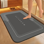 tapis bain gris moderne antidérapant motifs pas texture gaufrée noir sous sol salle bain