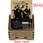 boîte musicale bois naturel motifs floraux 18 tons vintage manivelle horlogerie artisanale