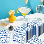 serviettes papier poissons stylisés fête enfant moderne océan blanc bleu anniversaire décors restaurant