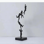 sculpture moderne figurines humaines empilées noir lisse décoration intérieure 51cm hauteur 14+ années