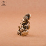 statuette ganesha bronze doré sculptée details complexes religieuse traditionnelle décoration intérieure éléphant dieuhindou ornement