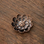 cendrier artisanal doré poissons motifs géométriques salon vintage