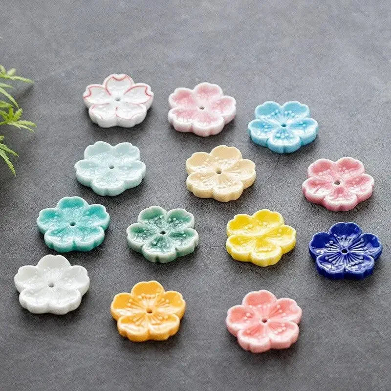 support bâtonnets encens fleurs stylisées artisanal rose bleu vert jaune blanc