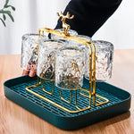support moderne transparent doré verres boire texture ondulée fixations métalliques élégantes