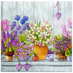 serviettes papier serviettes florales motif fleurs pots arrière plan bois rose violet bleu jaune