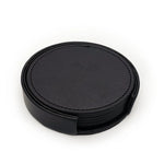 Un ensemble de sous-verres en cuir noir, pratique et élégant pour protéger vos surfaces.
