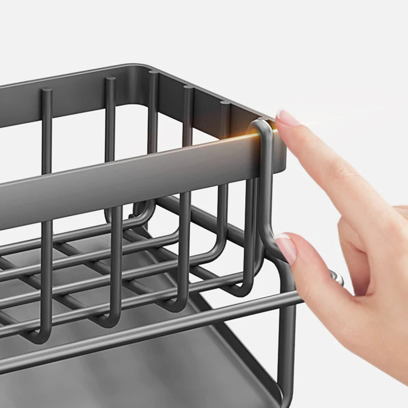 étagère cuisine moderne multifonctionnelle gris métallisé structure maille adhésif fixe serviette éponge vaisselle brosse