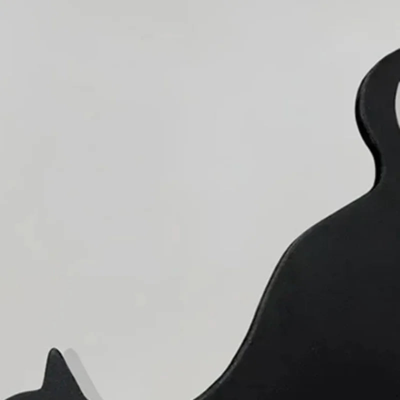 décoration murale adhésive silhouette chat noir minimaliste porte chambre maison