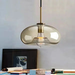 lampe suspendue moderne transparente brillante salon chambre dorée LED minimaliste câble noir