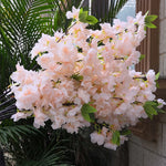 décoration intérieure branches fleurs artificielles cerises roses vertes mariage anniversaire