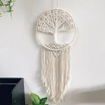 Tenture macramé arbre de vie dans un intérieur bohème