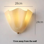 applique murale moderne verre soufflé texture ondulée marron beige jaune rouge chambre salon éclairage