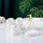 ensemble salle bain moderne marbre doré blanc distributeur savon porte brosse dents tasses plateaux