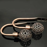boucle rideau métal bronze argenté doré cuivre moderne élégante perforée sphérique