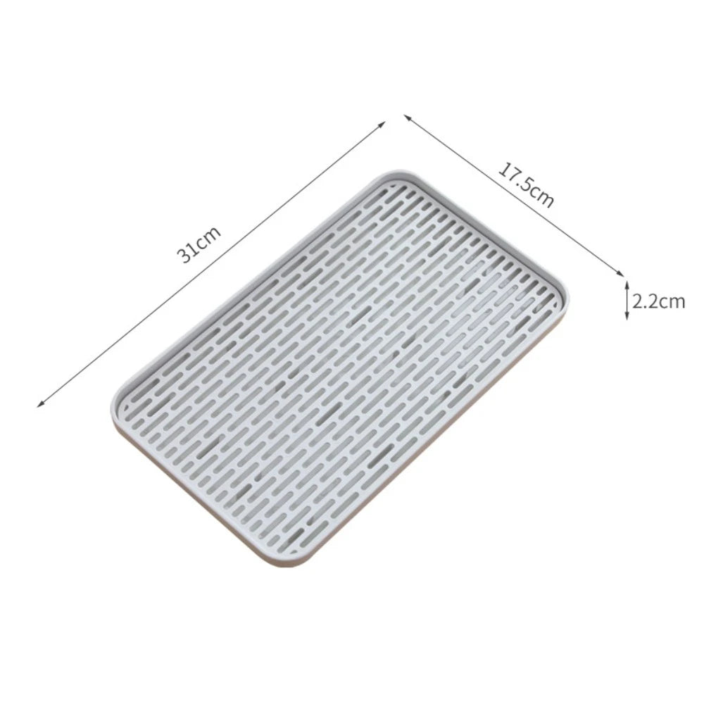 plateau rangement blanc moderne grille perforations tasse thé théière fruits tapis sol écologique