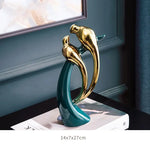 vases statuettes cerfs cygnes dauphins plateau deux étages distributeur serviettes baleine moderne élégant or