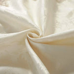 nappe table rectangulaire dentelle blanche broderie fleurs classiques élégante mariage banquet cuisine rustique