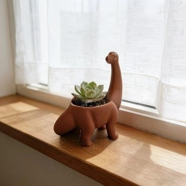 pot plantes forme dinosaure brachiosaure brun terracotta surface lisse aspect mat décoratif ludique menthe