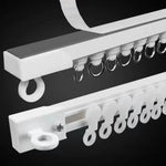 tige rideau moderne vis fixations rondelles blanches anneaux noirs blanc noir