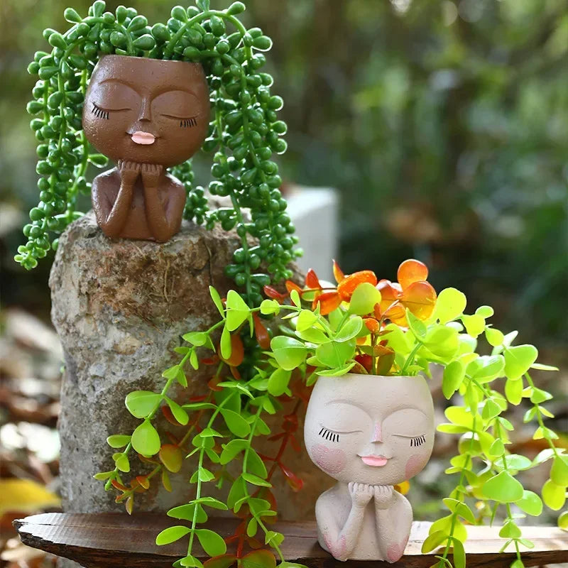 ornement résine pot fleur figurine humaine visage fermé minimaliste décoration jardin plante grimpante feuilles