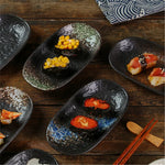 assiettes ovales céramique porcelaine sous glaçure noir blanc texture marbrée moderne rustique respectueux environnement