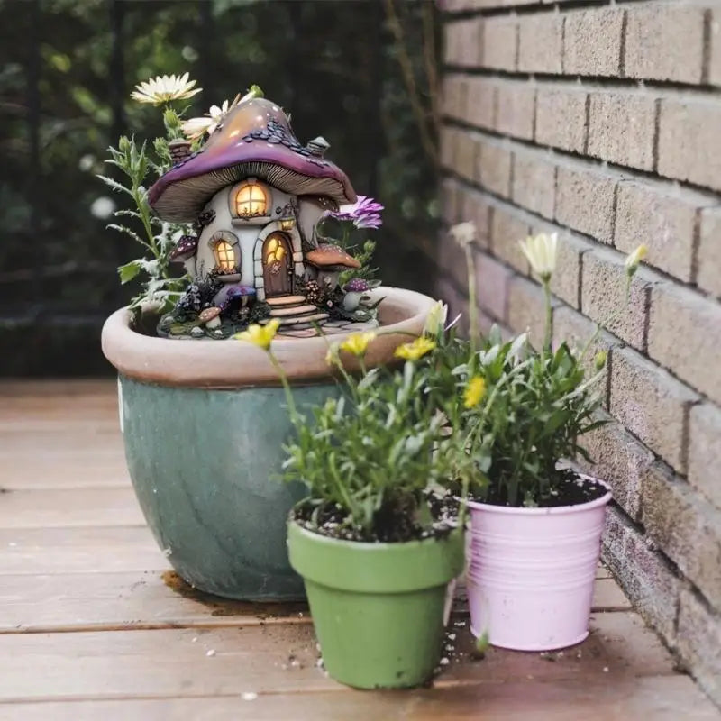 maisons miniatures jardin pierre mousse champignons détails floraux vert beige fantaisie pieds métalliques