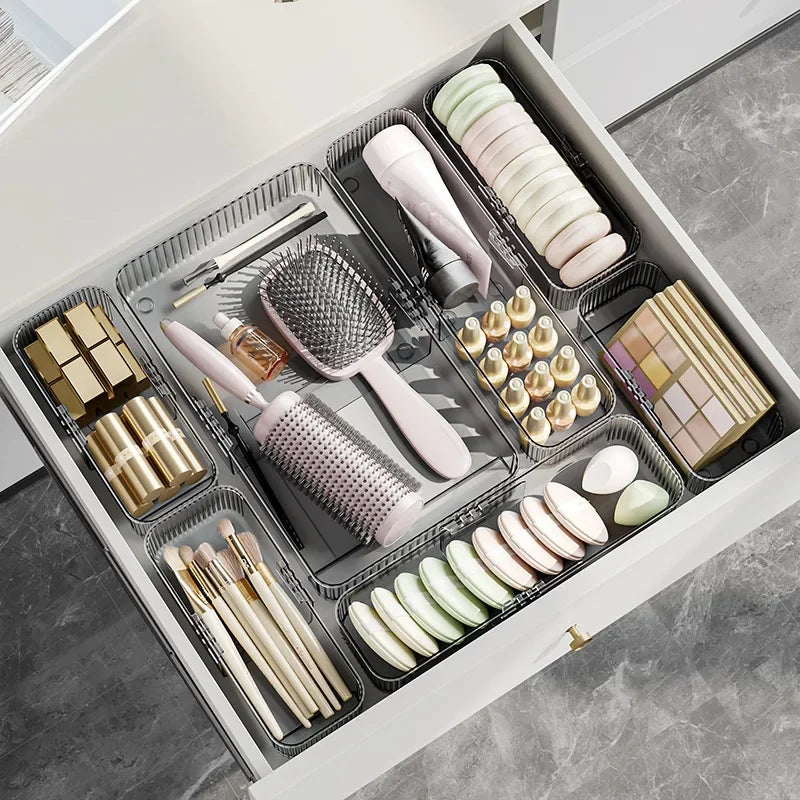 organiseur tiroir blanc adhésif couteaux cuillères fourchettes pinceau maquillage bouteilles cosmétiques sachets masques