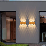 lampe murale moderne or noir contemporaine led extérieure aluminium fixations visées minimaliste