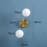 appliques murales modernes or blanc sphères verre translucides led murales fixations minimalistes