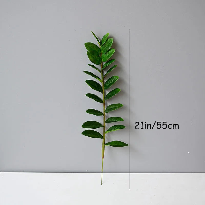 plantes artificielles branches vertes feuilles simples extérieur moderne pot blanc exposé
