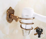 accessoires salle bain doré ornements sculptés finition brillante antique élégant porte serviettes savon toilette