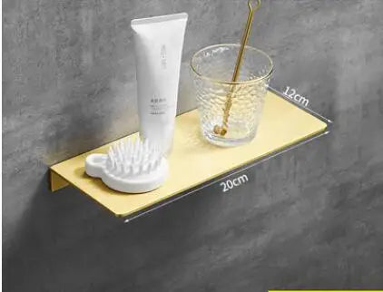 étagère murale moderne dorée lisse trois niveaux vis fixations salle bain aluminium