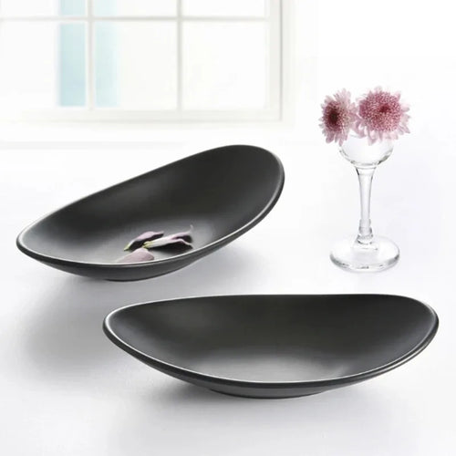 assiettes ovales forme feuille moderne noir mat decoration cuisine minimaliste plateau repas