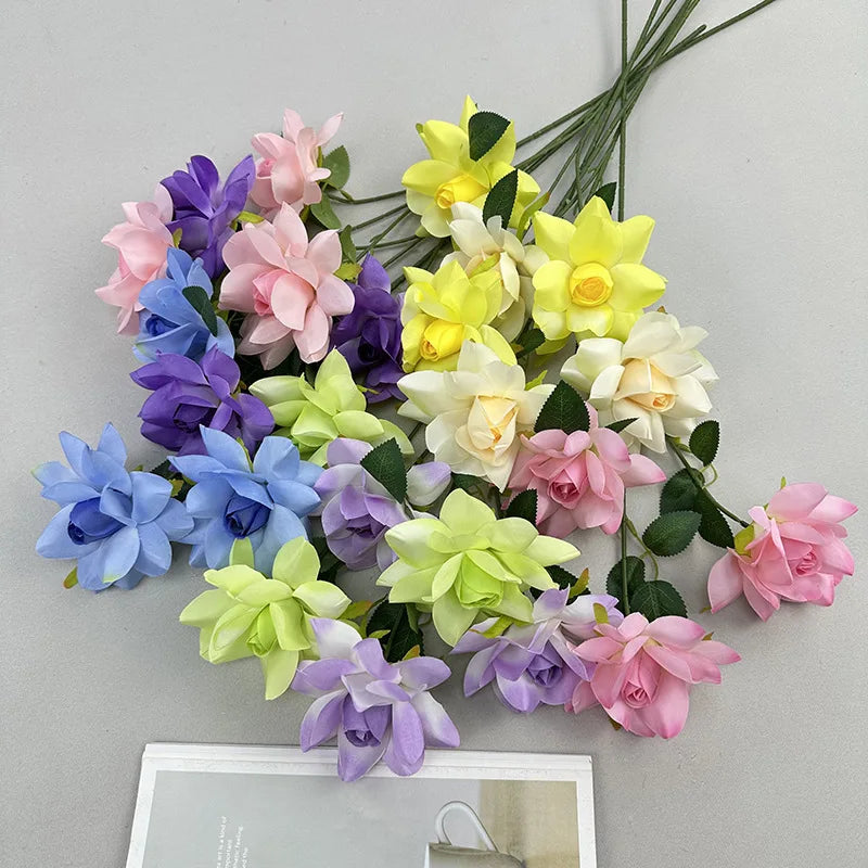décoration intérieure bouquet fleurs artificielles soie moderne vase livres minimaliste rouge jaune