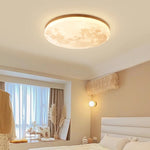 lampe bois lunaire texture marbrée moderne blanc doré minimaliste