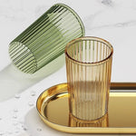 verres dents transparents moderne rayures vertes gris doré élégants