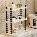 étagère trois niveaux moderne minimaliste blanc noir cosmétiques parfums tasses blancs