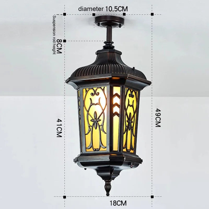 lampe rue classique verre teinté noir doré motifs floraux éclairage extérieur résistant intempéries