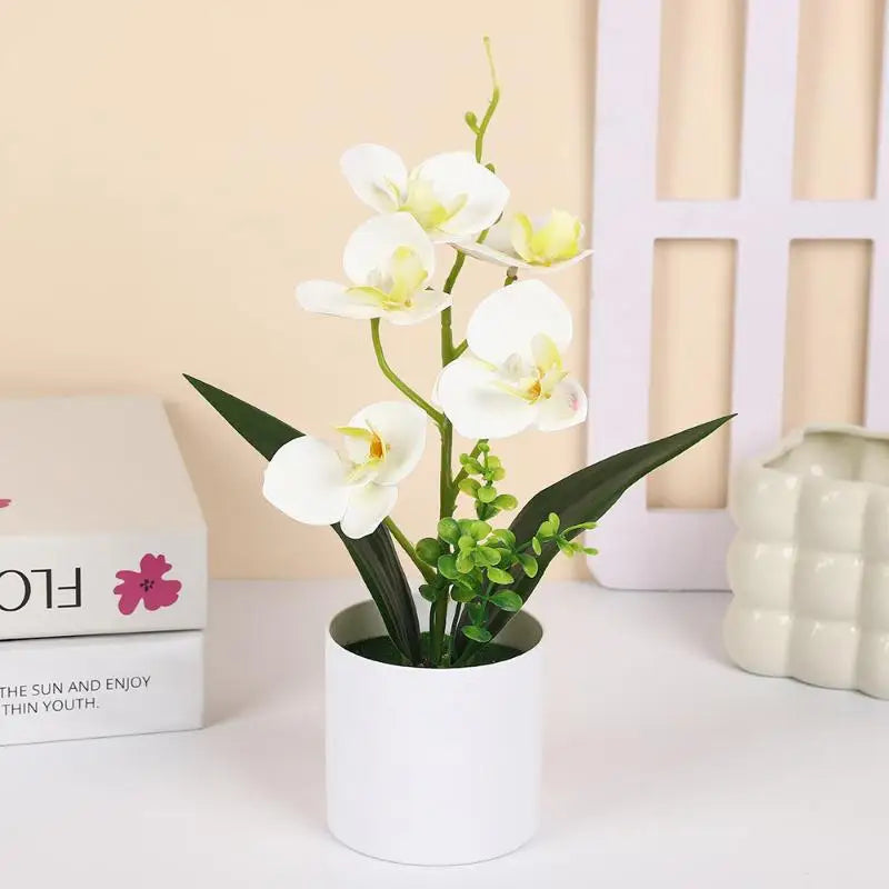 décoration intérieure orchidées artificielles pots blancs fleurs simples feuilles vertes moderne