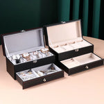 boîte rangement cuir noir montres bijoux élégante boutons fermeture moderne