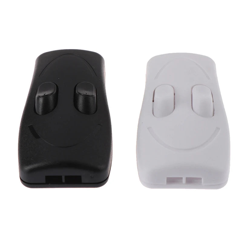 télécommande moderne sourire noir blanc commande bouton poussoir haute tension