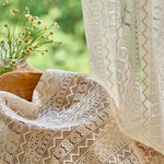 rideau boho chic beige clair dentelle fine motifs géométriques pompons blancs 100 coton résistant