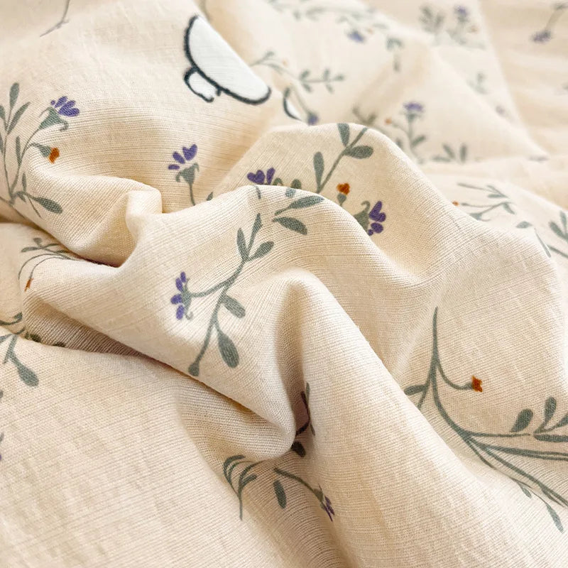 couette d'été légère enfant beige motifs fleurs feuilles coton doux décorative chambre enfant