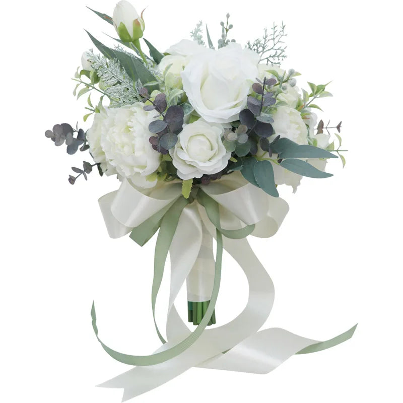 Bouquet de fleurs artificielles blanc ivoire utilisé comme centre de table pour un événement