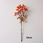 décoration intérieure bouquet artificiel feuilles baies rouge orange naturel rustique