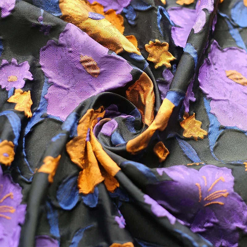 tissu semi transparent floral relief noir violet orange décoration couture jacquard polyester respectueux environnement
