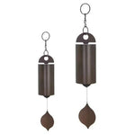 sonaille éolienne cloche vent marron feuille verte rustique nature minimalisteextérieur forêt lac neige
