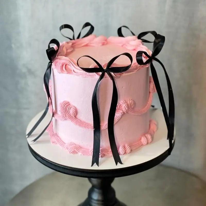 décorations gâteau forme ruban nœud noir rose rouge satin vintage élégant festif pic fixé
